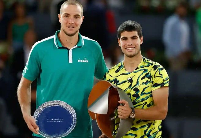 Carlos Alcaraz (right) and Jan-Lennard Struff. Photograph: Oscar J Barroso/AFP7/Shutterstock